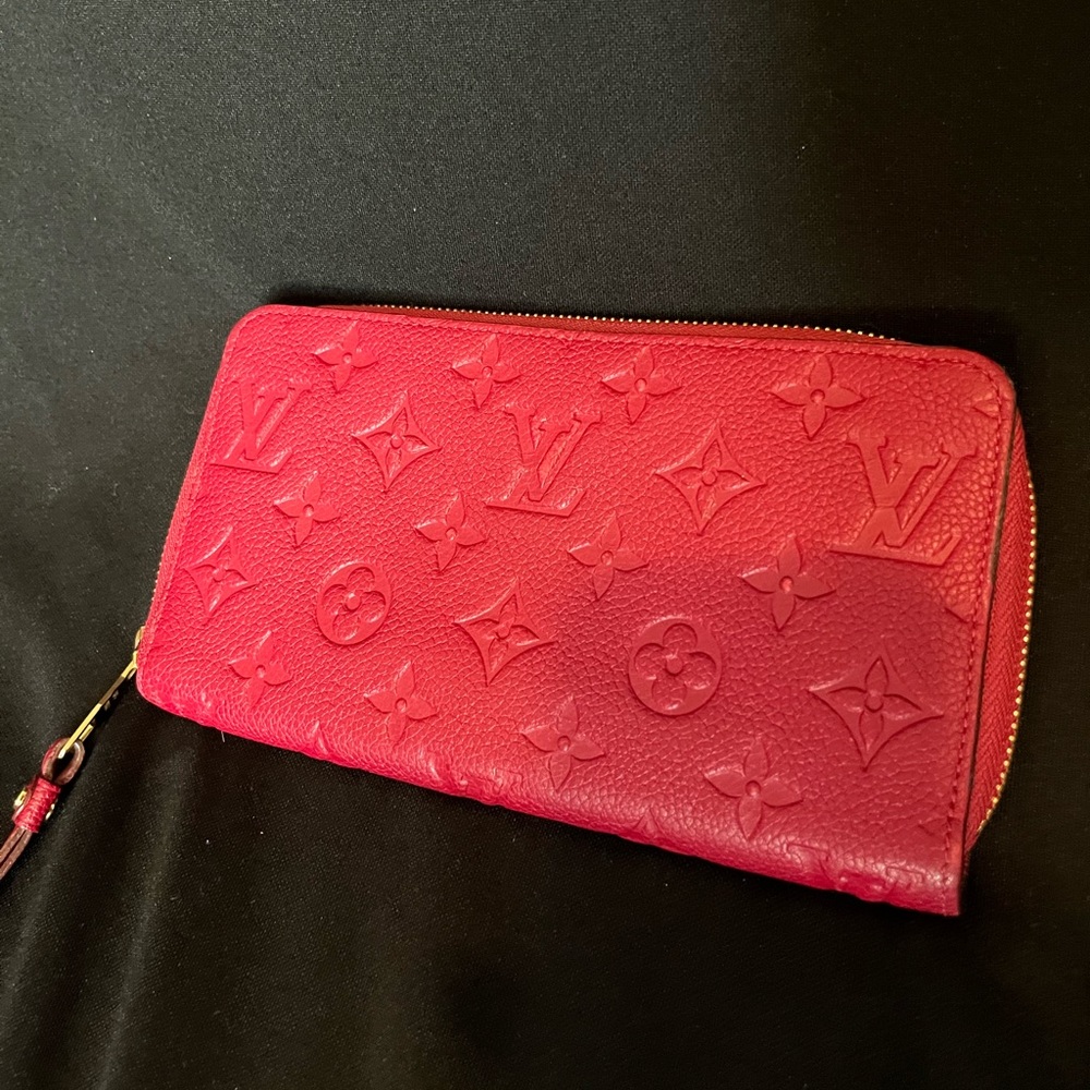 Louis Vuitton zip up red wallet